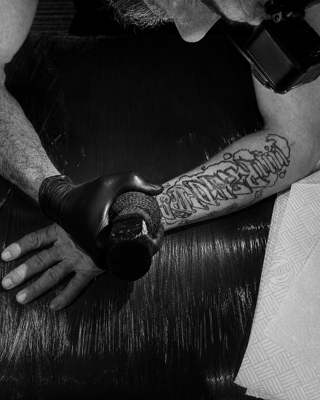 Keith Pennington tattooing at Inked Skin